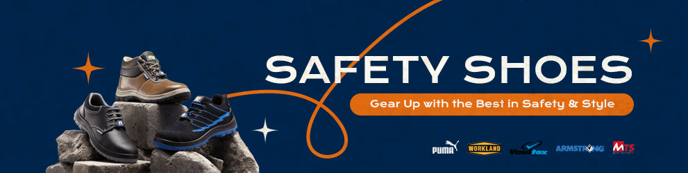 Various styles of safety shoes from brands like Puma, Workland, Vaultex, Armstrong, and MTS displayed on concrete blocks against a dark blue background with the text 'Safety Shoes – Gear Up with the Best in Safety & Style'.