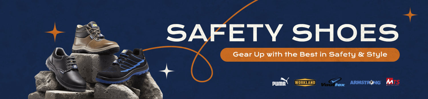 Various styles of safety shoes from brands like Puma, Workland, Vaultex, Armstrong, and MTS displayed on concrete blocks against a dark blue background with the text 'Safety Shoes – Gear Up with the Best in Safety & Style'.